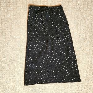 THE MOON Midi length black skirt